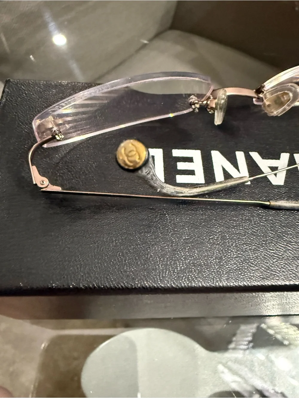 CHANEL Rimless Women's Glasses with bronze Accents